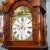 Antique Scottish grand father clock. C.1827-1856. of oak, mahogany, and yew woods with a multi shaped pediment and body.