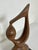 A teak abstract figurative sculpture (23" high) signed with initials H.A, circa 1970s.