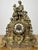 This elegant vintage brass clock is a wonderfully decorative statement piece, featuring an ornate mantel design with...