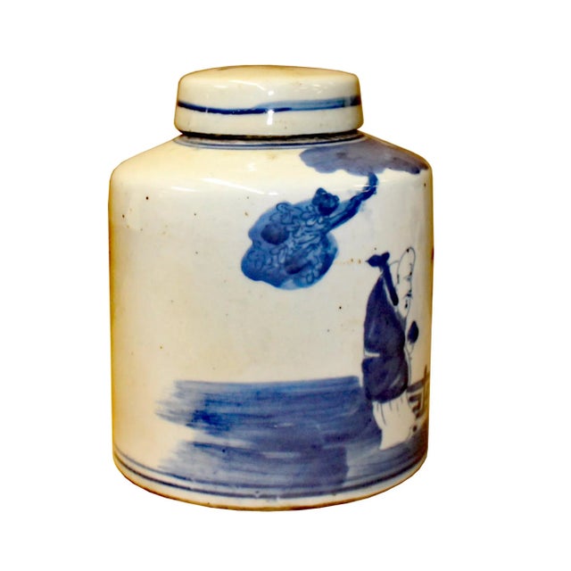 This is a handmade ceramic container urn jar in the white base color. The surface has a blue color oriental 3 stars god...