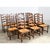 A set of fourteen ladderback and rush seat French side chairs will add classic Provincial style to any dining room....