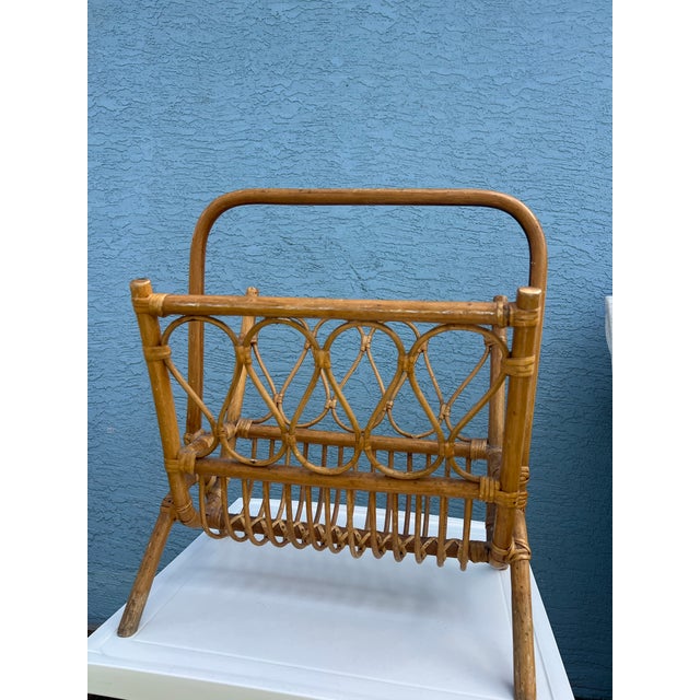 Keep your newspapers and magazines organized and neat in this vintage book holder. A stylish vintage bamboo magazine rack...