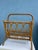 Keep your newspapers and magazines organized and neat in this vintage book holder. A stylish vintage bamboo magazine rack...