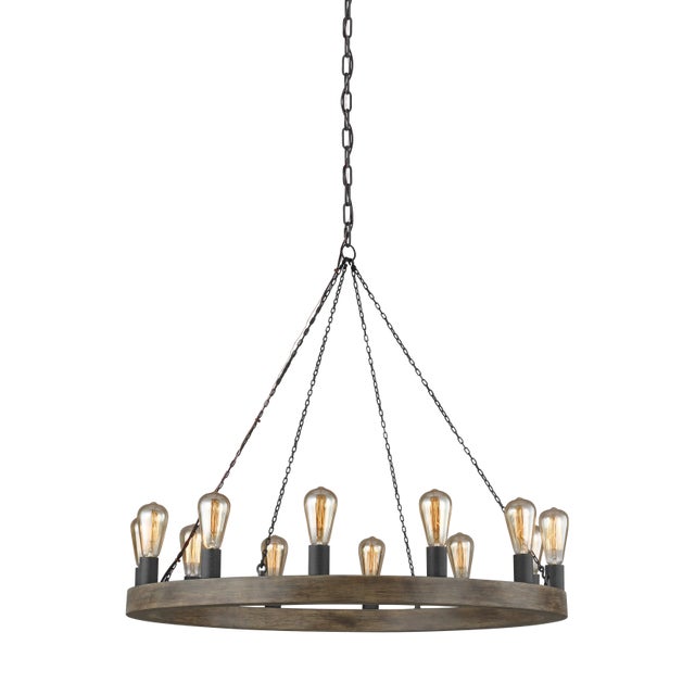 The Avenir twelve light single-tier chandelier in weathered oak wood / antique forged iron enhances the beauty of your...