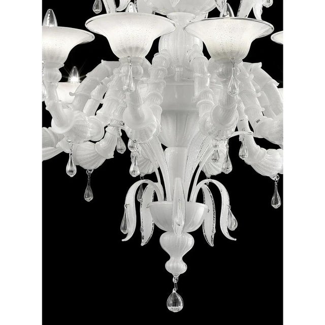 Contemporary Lively white “Cà Rezzonico” Murano Glass Chandelier. The arms are working in traditional working “Cà...