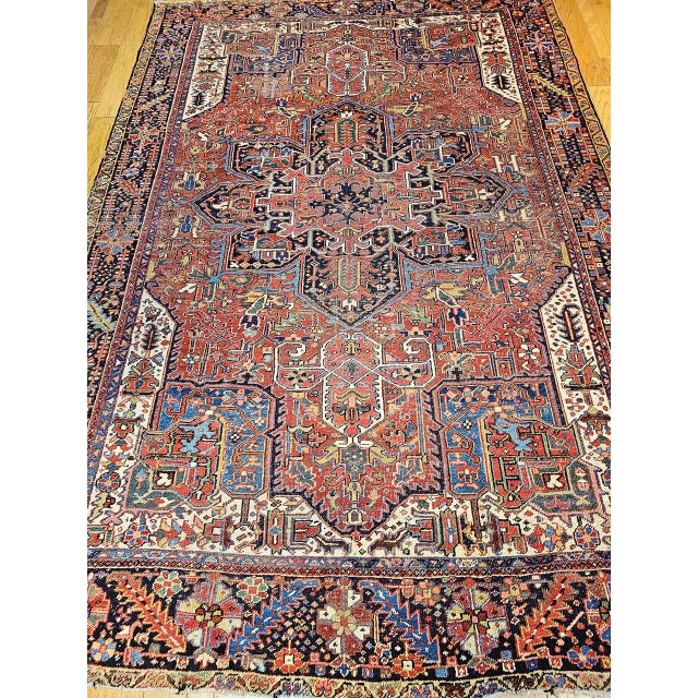 "This vintage Persian Heriz rug from the esteemed village of Karajah in NW Persia's Azarbaijan district. The Heriz Karajah...