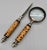 A beautifully matched desk set comprising a magnifying glass and letter opener, each featuring a turned bamboo handle with...