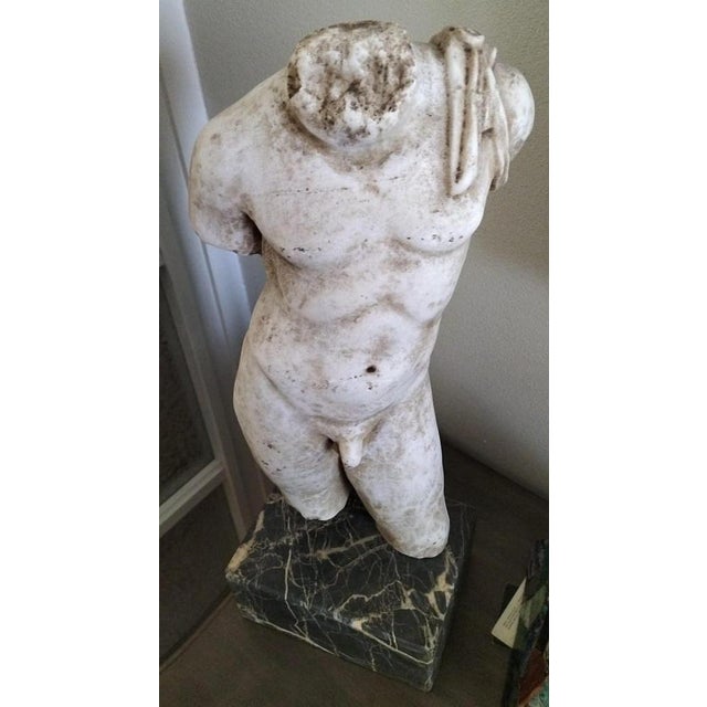 Fine male torso in Greek Thassos marble with base in black Imperial marble, late 18th century Origin Venice, private...