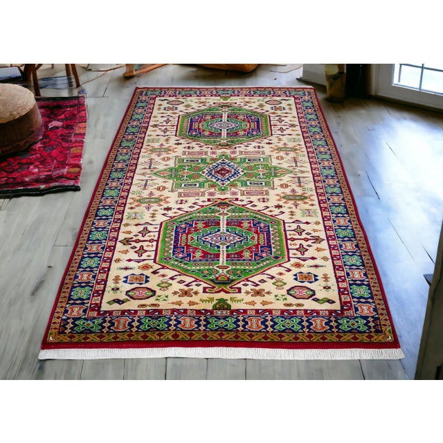 Size: 83" x 124" or 6 ft 11 in x 10 ft 4 in Excluding fringe Material: Wool on cotton Condition: Original rug is used. In...