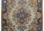 A wonderful early 20th century Persian Kirman rug with a large central floral medallion woven in traditional Kiram colors...