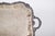 Metal liqueur tray, rectangular in shape, the central part is decorated in low relief, with a classic and elegant...