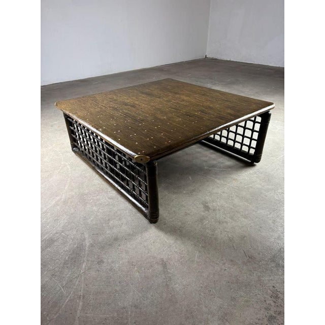 Coffee table designed by Tobia Scarpa, crafted in bamboo with a top made of bamboo canes secured with copper nails,...