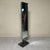 A vintage floor mirror in the 1970s–1980s style, featuring clean lines and sleek proportions typical of Italian design of...