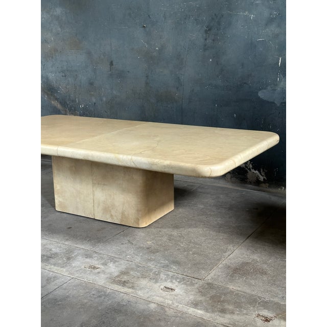 Monumental pedestal authentic goatskin dining table in the style of Karl Springer. Extension table with one leaf and a...