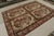 Handwoven in wool, this 7x9 flatweave rug “Acanthus” from China features floral patterns that are often seen in botanical...