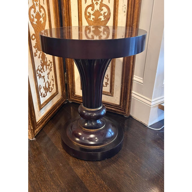 Dorothy Draper Classic Urn Flute Side Table from Kindel with Gilt Accents in Bark Satin Finish. A very solid piece that...
