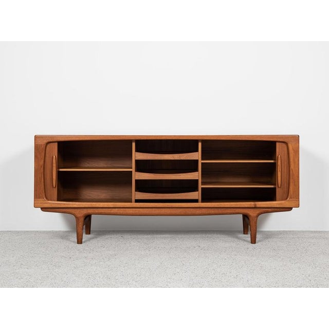 This sideboard is designed by Johannes Andersen and manufactured by Silkeborg in Denmark in the 1960s. This sideboard...
