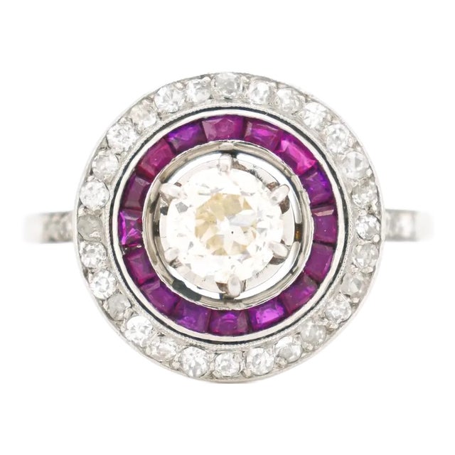 Circa 1930 Antique French Art Deco Engagement Ring, Platinum, Diamonds, and Ruby Halo For Sale