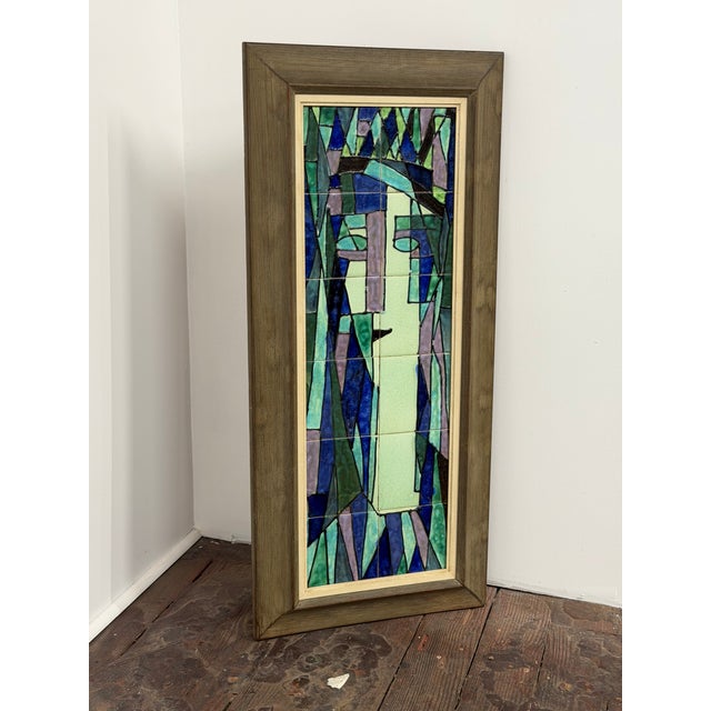 Large twelve tile modernist ceramic tile female portrait. Circa 1960. Signed on reverse with the Harris Strong paper...