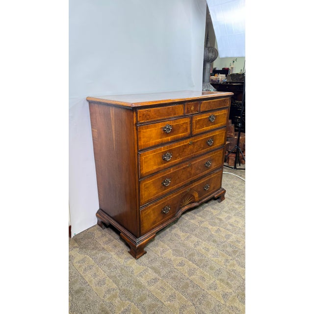 Very nice inlay details, European dovetail construction, extra top two secret drawers. Great book match burl veneer details.