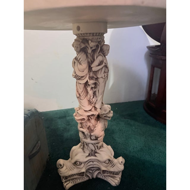 Selling a stunning, highly detailed Mid-Century Modern Chinoiserie pedestal accent table from the 1960s. This piece is...