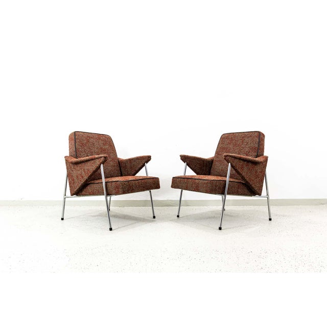 A pair of armchairs manufactured by Fabryka Mebli Wschód in Zadziele, Poland, in the 1960s. The seats have been newly re-...