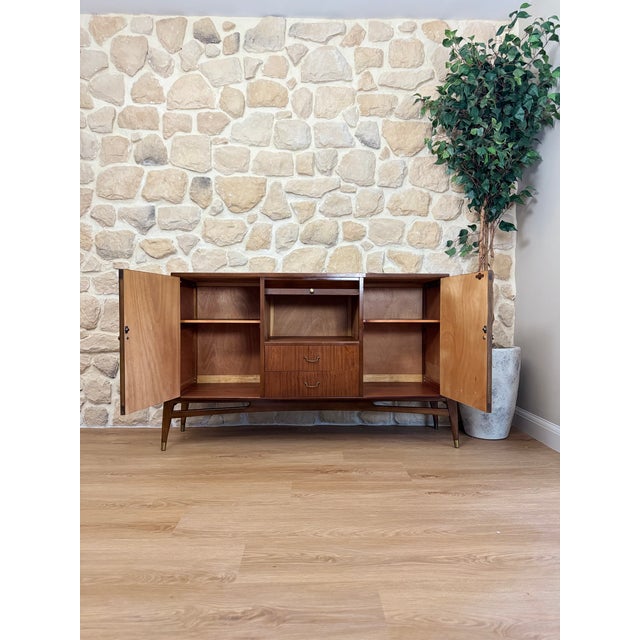 This is a beautiful strongbow sideboard, a stand out midcentury piece that has great presence in any room. it has been...