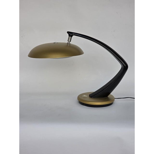 The Fase Boomerang 64 lamp is an icon of Mid-Century Spanish design from the 1960s, created by Luis Pérez de la Oliva for...