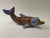 Brass and Porcelain Dolphin Sculpture. Possibly made by the acclaimed Mexican artist and sculptor, Sergio Bustamante. This...