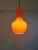 Space age pendant light in orange opaline glass, produced by the italian manufacturer targetti sankey, 1960s-70s....