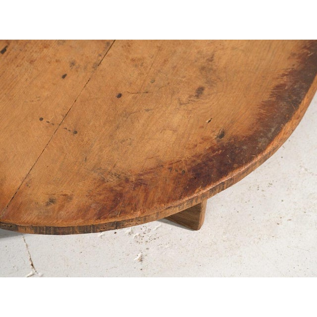 Antique cutting board in solid wood, central european rural utensil originating from central europe and dated circa 1920....