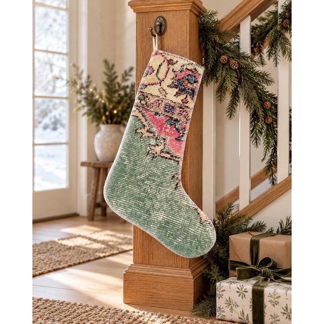 This one-of-a-kind Christmas stocking is hand-altered from an authentic vintage Turkish rug, hand-knotted in wool circa...