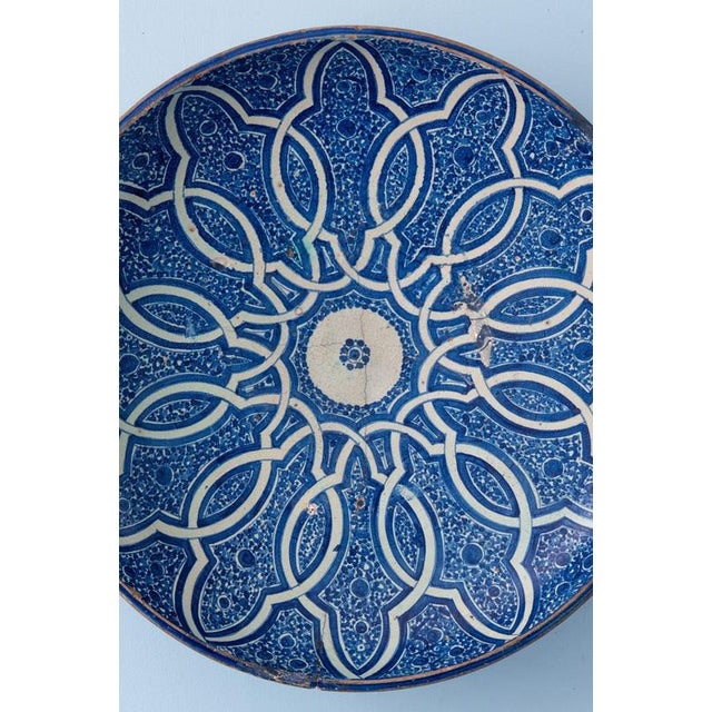 Diameter: 42 cm Height: 9 cm Historical restoration to body. Some wear and repairs to glaze, commensurate with age Three...