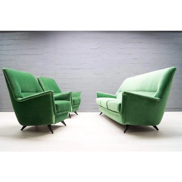 This Italian green sofa was produced in the 1950s.