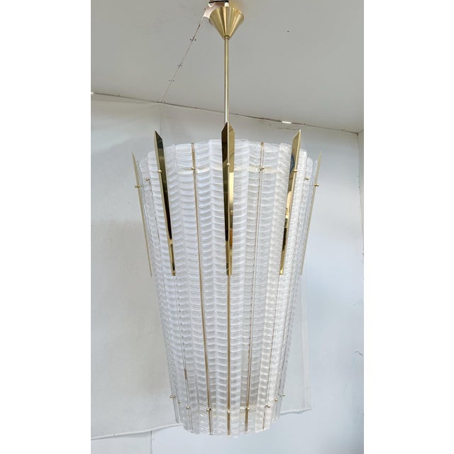 Monumental Italian lantern with frosted Murano glass mounted on unlacquered natural brass frame and details / Made in...