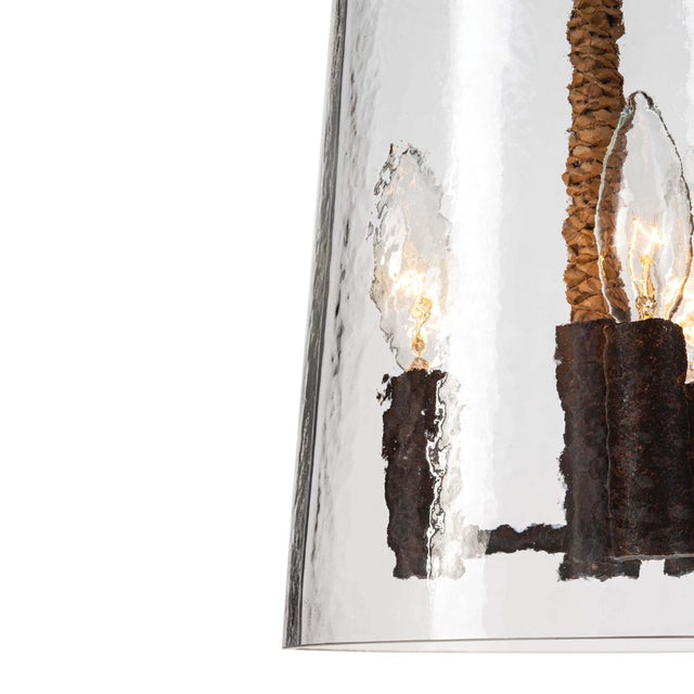 A wrapped rope stem and water glass make this coastal chic pendant one to watch. Fashion-forward accents like slightly...