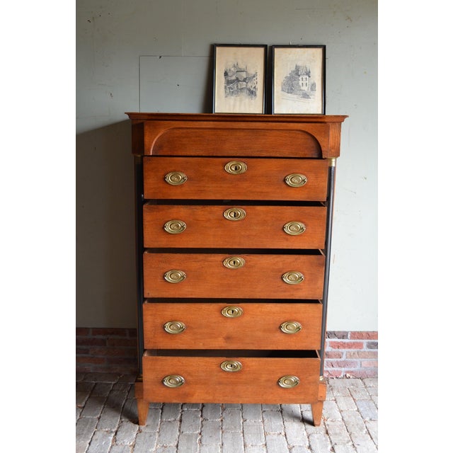 19th-century Dutch oak Empire chiffonier, chest of drawers. The height is 156 cm. The width is 102 cm. The depth is 51 cm....