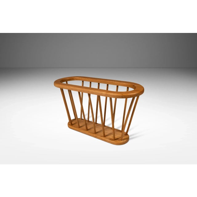 Introducing a splendid umbrella stand in the manner of Arthur Umanoff. Cut from solid Ash with beautiful woodgrains this...