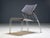 A pair of sculptural shell chairs produced by ikea in the late 1990s–2000s, representing the brand’s move toward sleek,...
