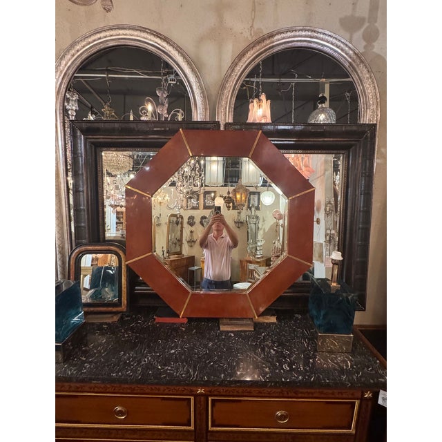 The Italian MCM Design Parchment and Brass Octagonal Mirror is a stylish and versatile piece perfect for various rooms in...