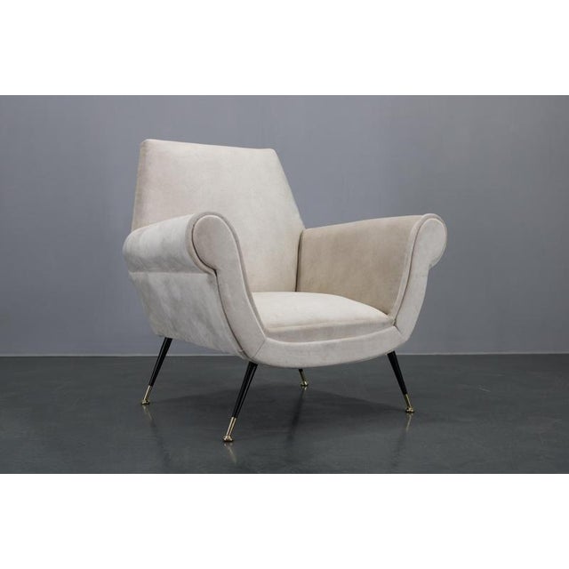 Newly upholstered in quality velvet fabric including the new padding