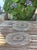Two large vintage round trivets resting on six molded pressed glass feet with a beaded decoration Dimensions Diameter: 23...