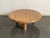 This monumental table introduces commanding architectural presence and rich organic texture into an interior. Crafted in...