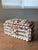 This vintage English trinket box is entirely clad in collected shells — each one thoughtfully hand placed to create a...