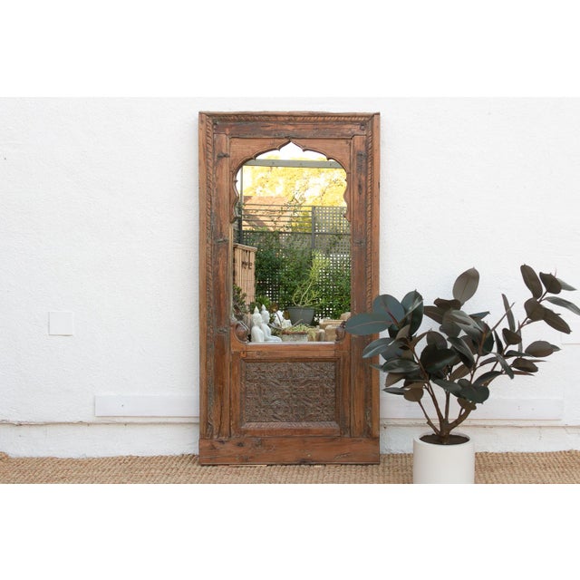 This stunning piece is a genuine fragment of ancient Indian architecture, originating as a window or door panel from a...