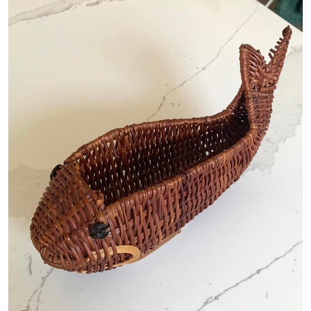 Charming two tone wicker fish basket. Great for display and holding your keys or candy.