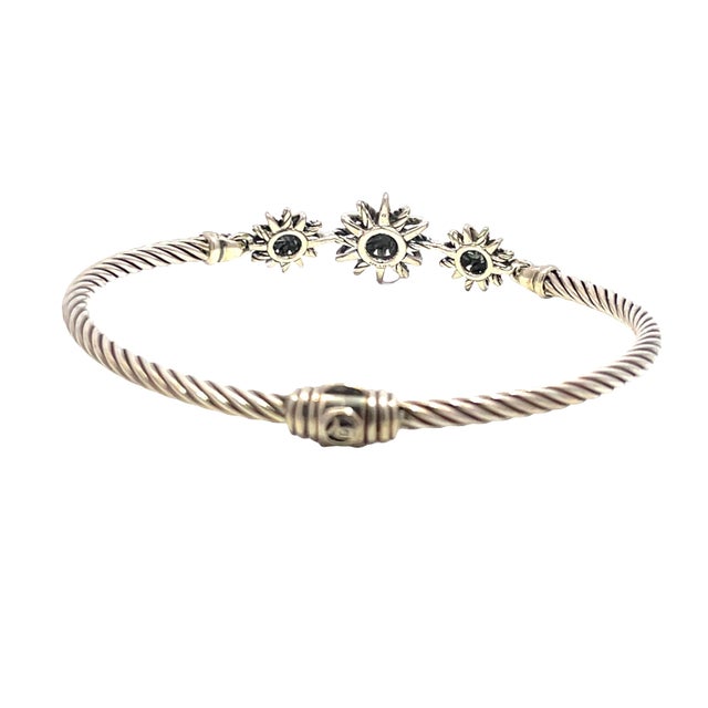 Elegant David Yurman Starburst bracelet crafted in sterling silver. Total weight: 11.5g. Fits approx. 2.5–3 inch wrist...