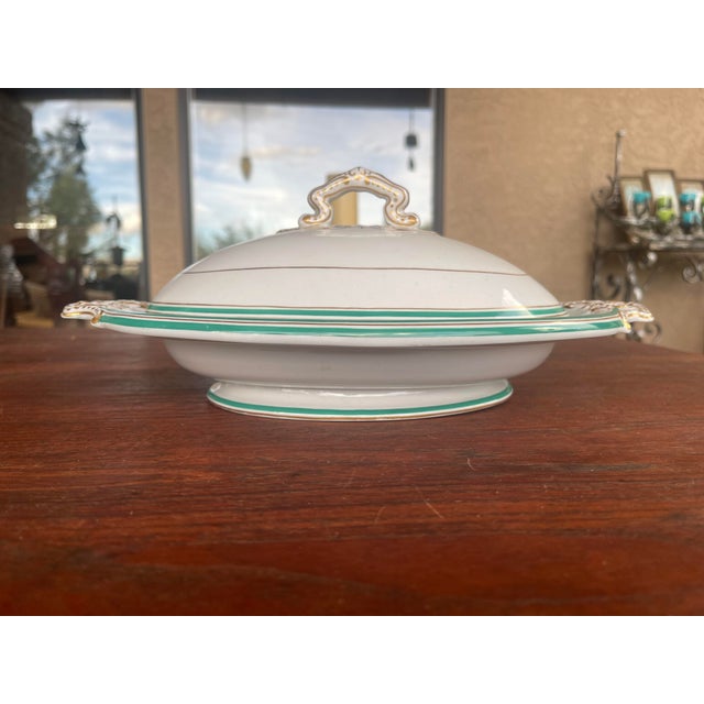 Here is a beautiful 19th Century Porcelain Tureen that is striking with the gold leaf and green stripes in great...
