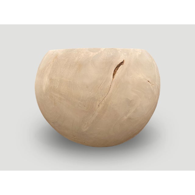 Reclaimed teak wood which we have hand carved into a beautiful drum shaped side table and bleached. The top is 15"...