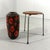 Colourful large ceramic vase, floor vase, West-Germany. Brown Fat Lava ceramic with redorange glossy pattern, probably by...